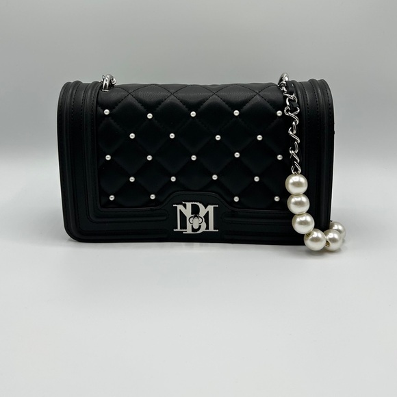 Badgley Mischka Handbags - Badgley Mischka
Black Quilted Bag with Pearl Chain brand new